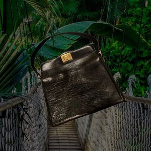 14. Etienne Aigner Bag